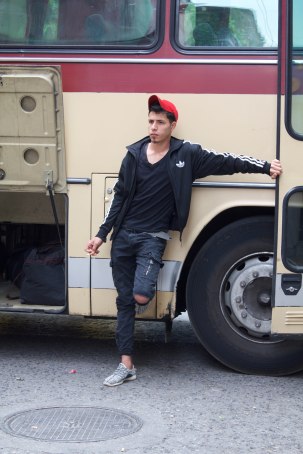 Feron hotel leaning against bus